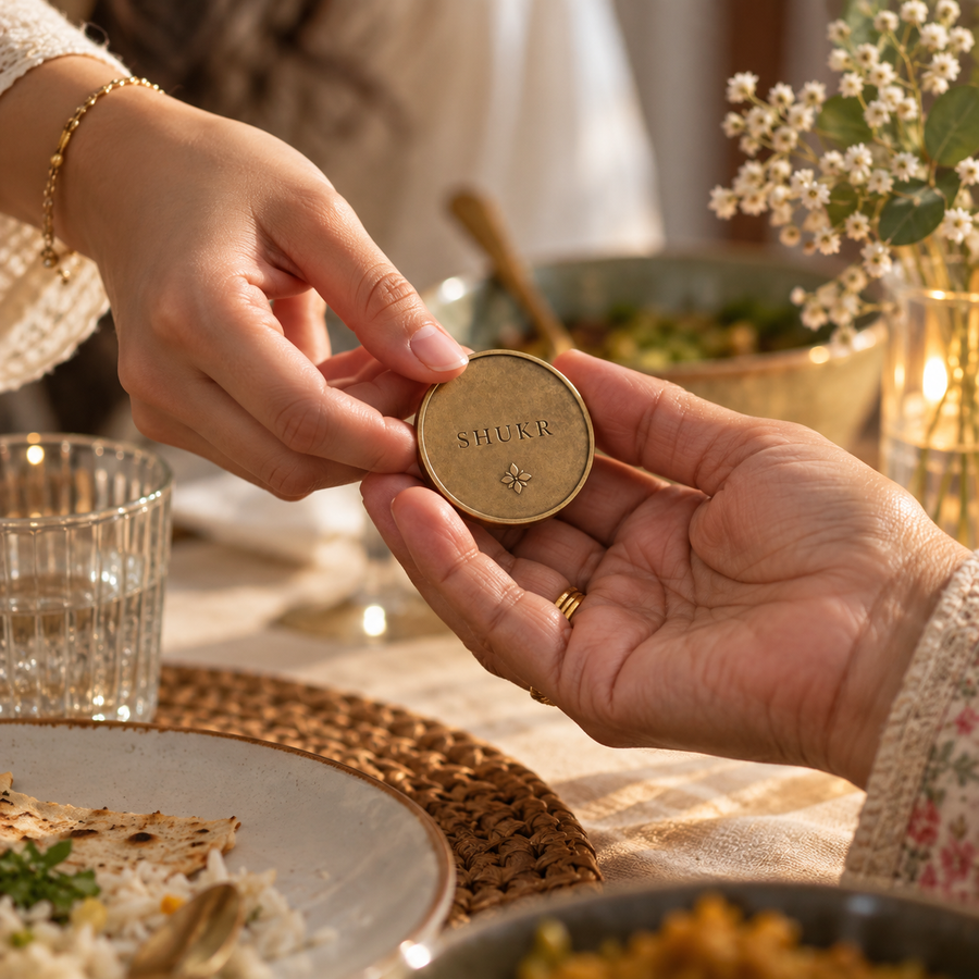 AI-generated editorial lifestyle image showing the Shukr Coin being given as a thoughtful gift. community moment